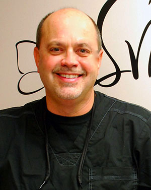 Headshot of a smiling Dr. Harry Habbel